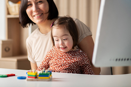 Baby with Down Syndrome with mom