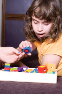 girl playing with a toy