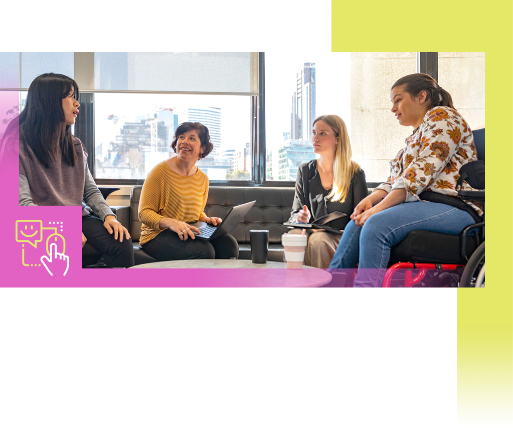 Group of 4 people meeting in a high rise office setting