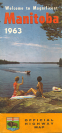 People on rock, lake with boat